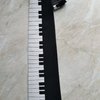 Kravata hedvábí Robin Ruth 065-A černobílá s motivem klaviatury